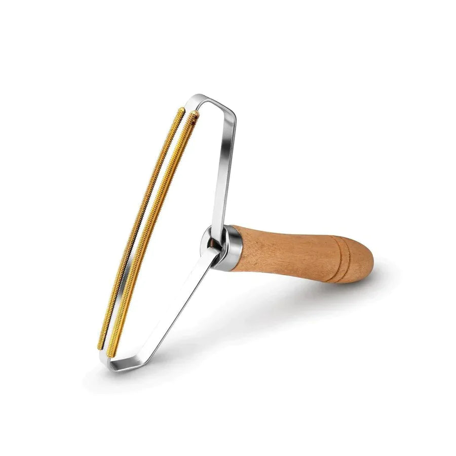 BROSSE ANTI-CHEVEUX ET LINTHES TOOLIT